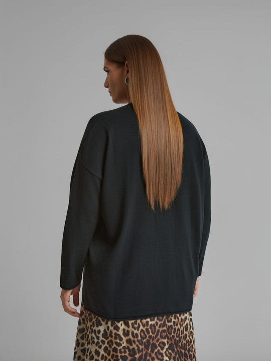 Black V-neck sweater with roll hem, long sleeves, relaxed fit