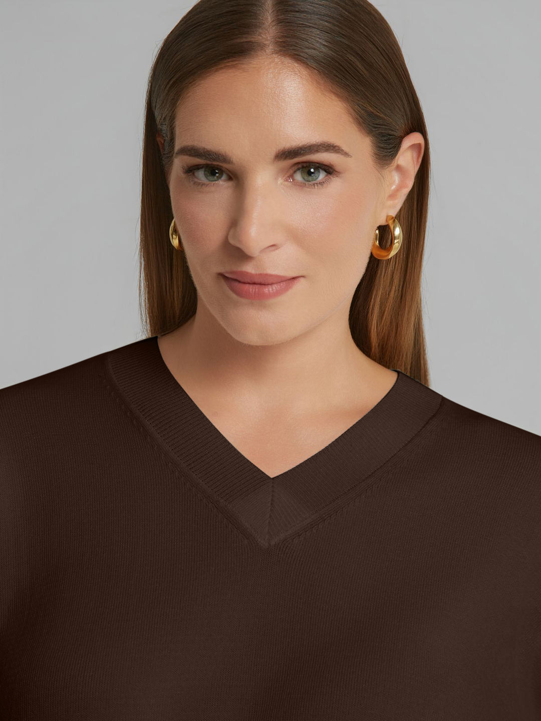 Brown V-neck knit sweater with ribbed V-neck collar