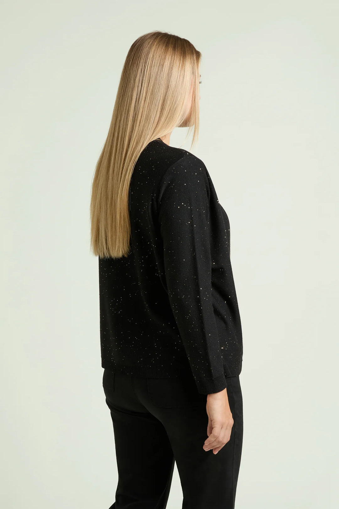Black long-sleeve top and open jacket back view with stone-like speckled embellishments