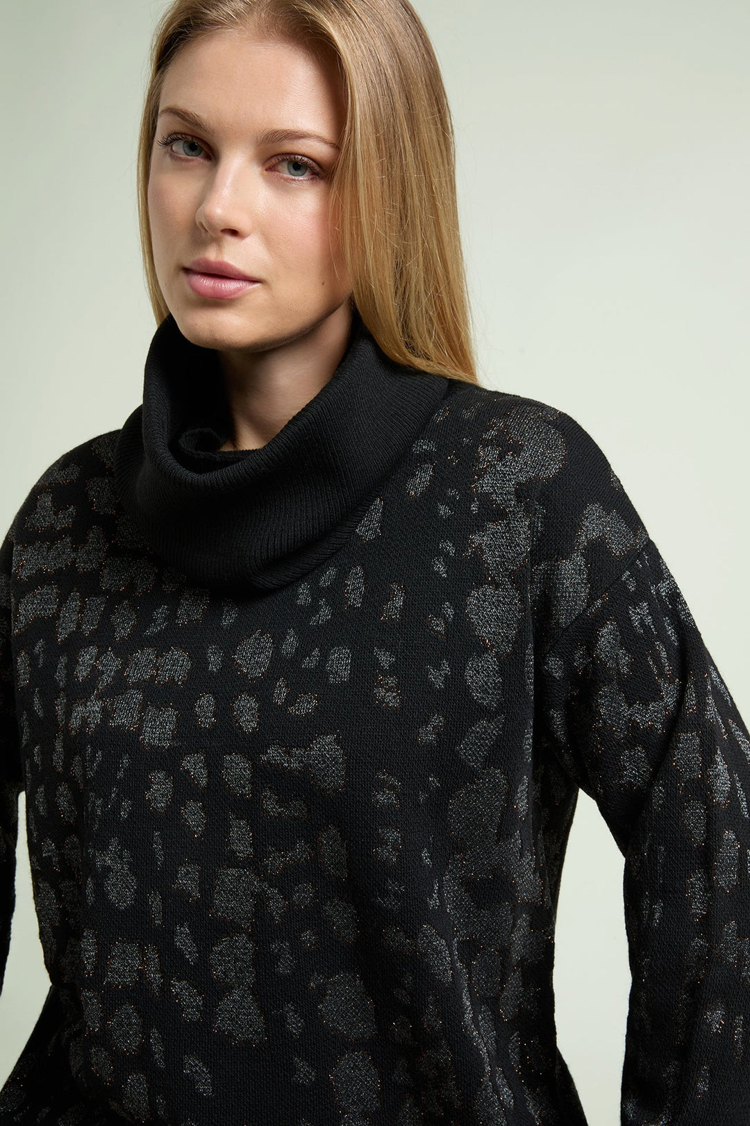 Black long-sleeve animal print top with high cowl neck and jacquard texture