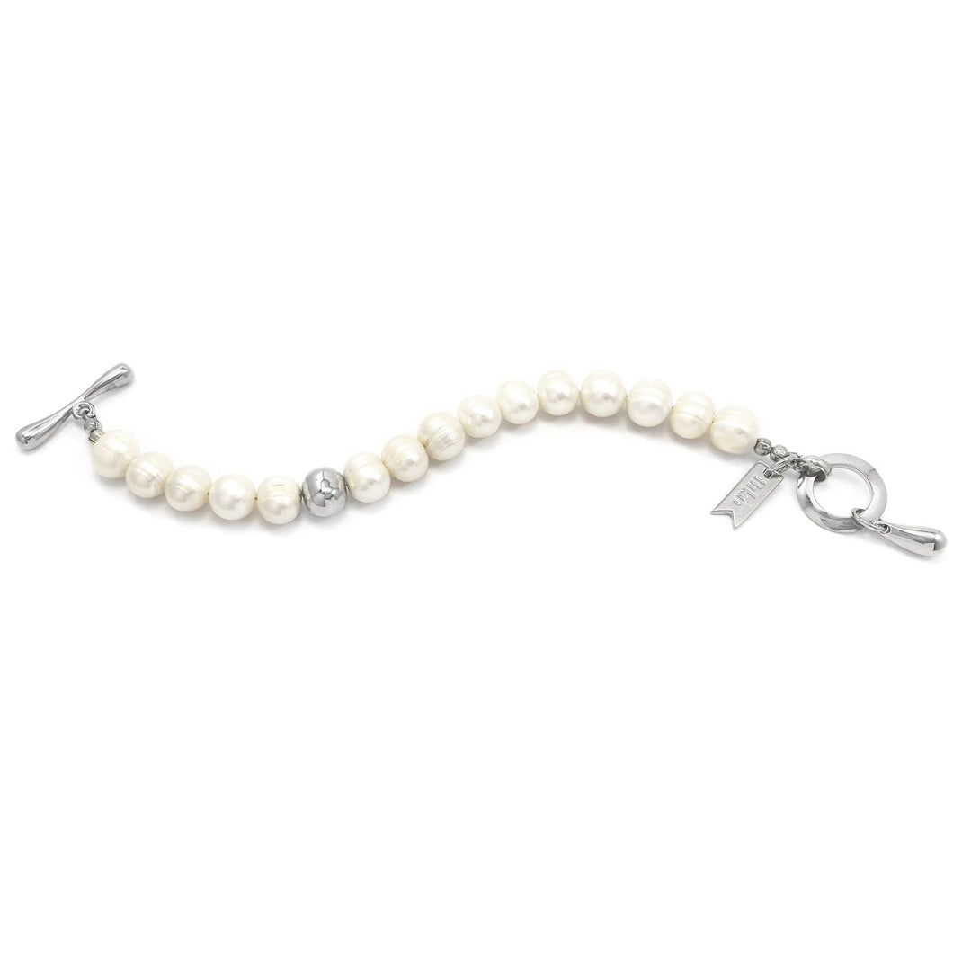 Silver pearl bracelet with bead strand, toggle clasp, and dangling bar charm