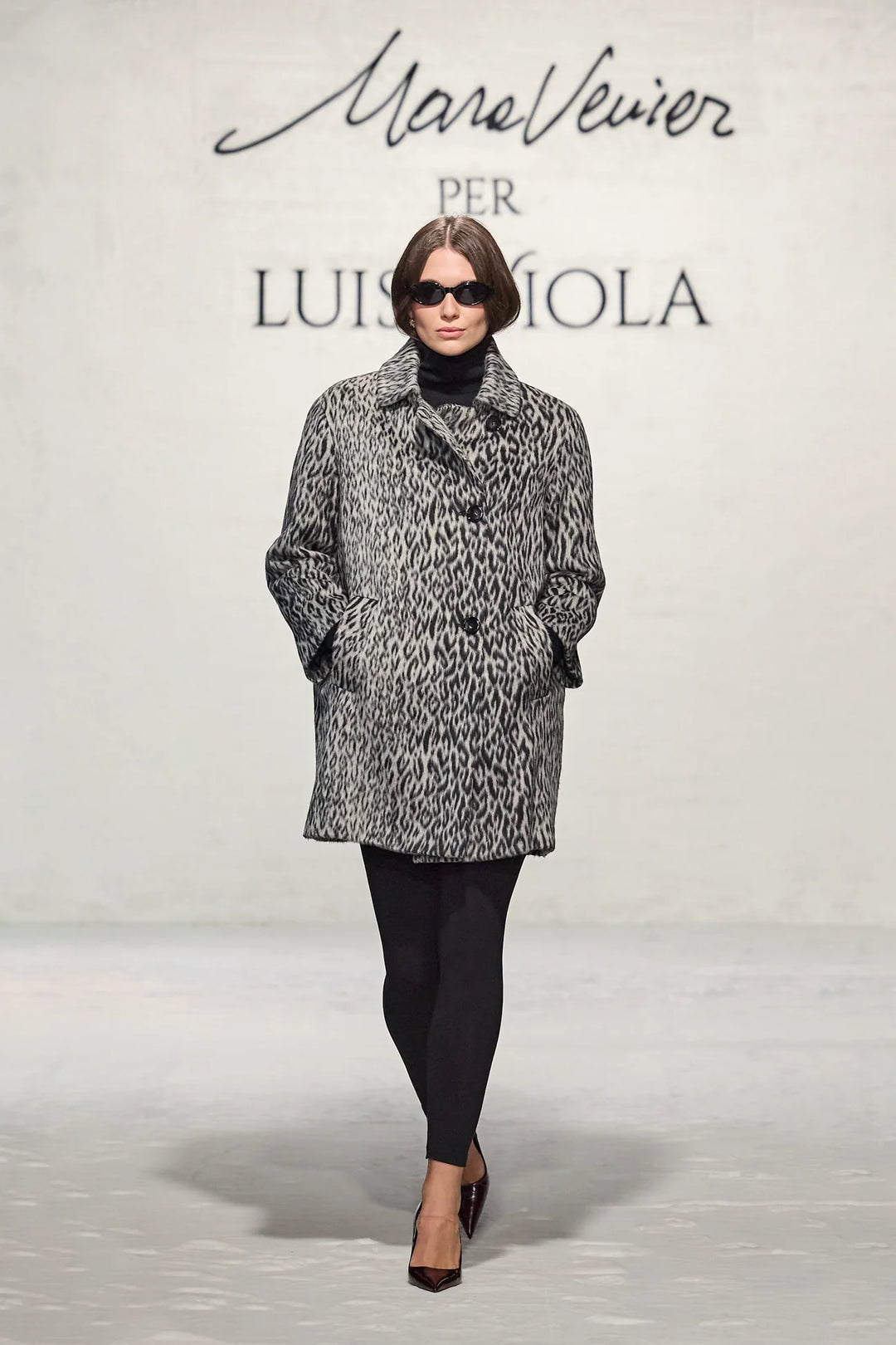 Leopard print high-collar topcoat with button front and long sleeves