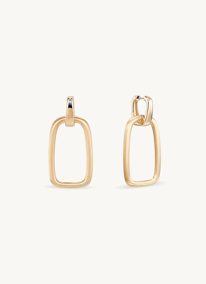 Gold drop hoop earrings with polished oval clasp and matte rectangular open frame pendant