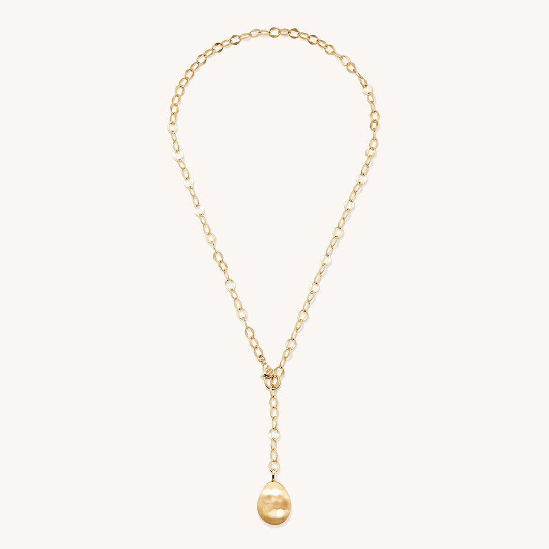 Gold lariat necklace with oval chain links and egg-shaped pendant drop