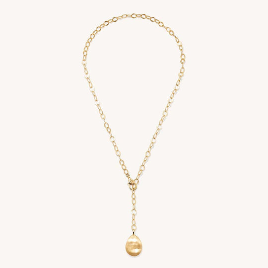 Gold lariat necklace with oval chain links and egg-shaped pendant drop