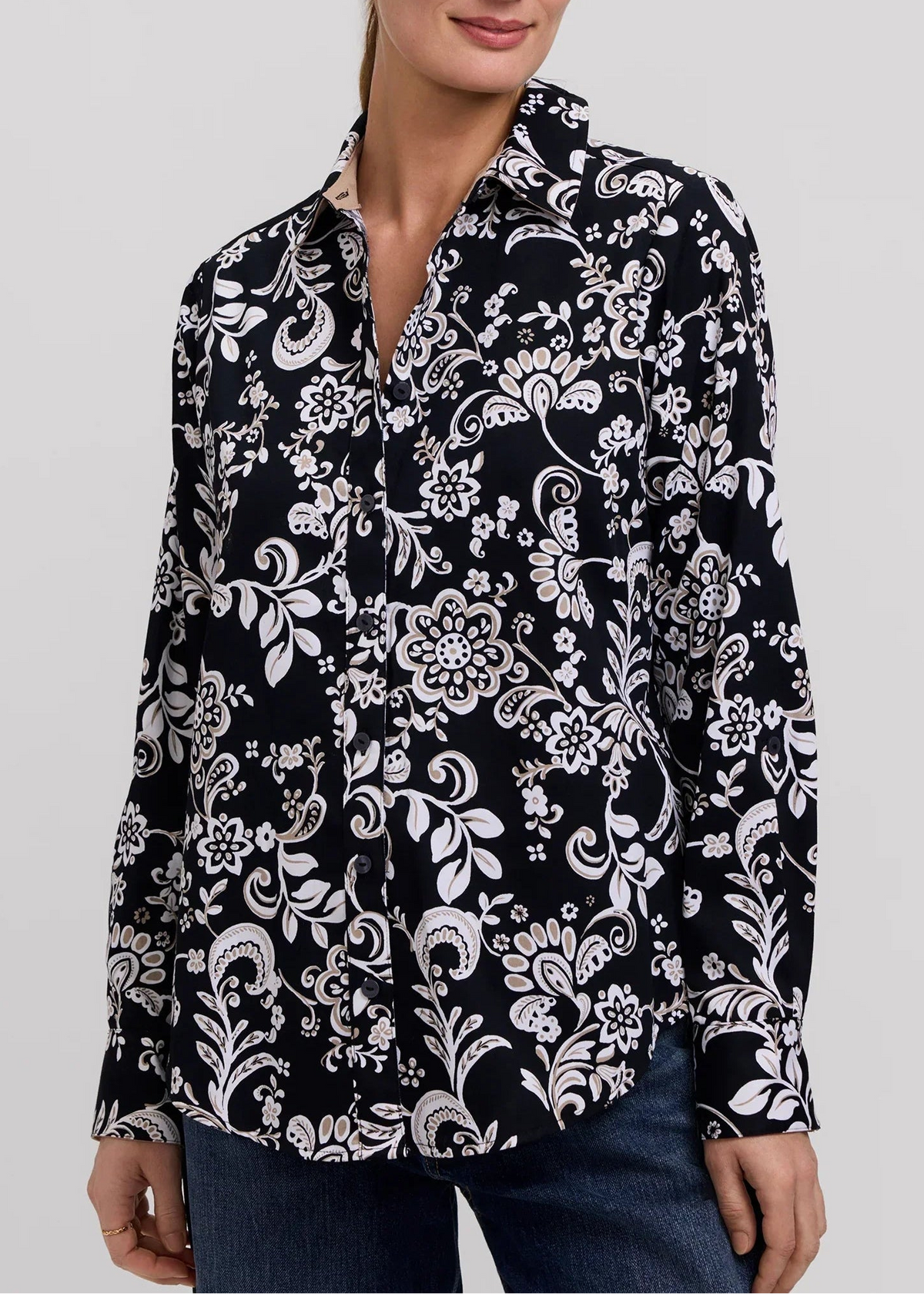 Black floral print long sleeve shirt with button front, roll-tab cuffs