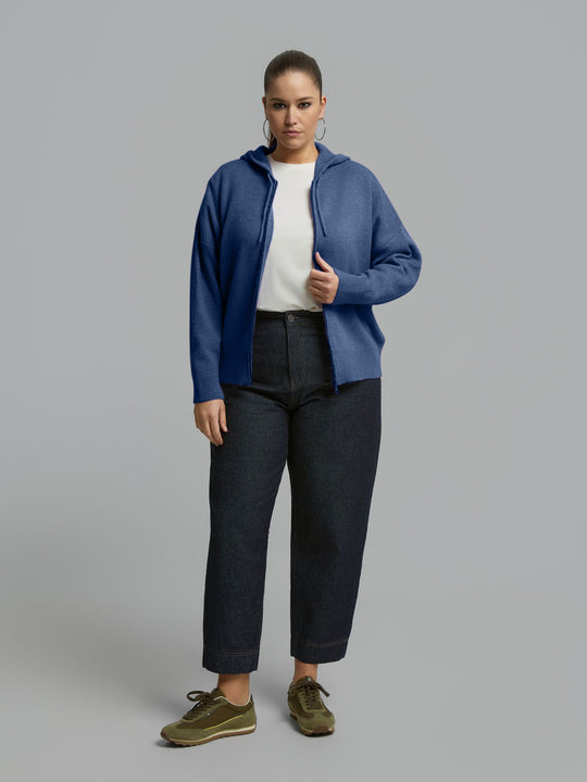 Indigo knit zip-front hoodie with hood, full-body model view