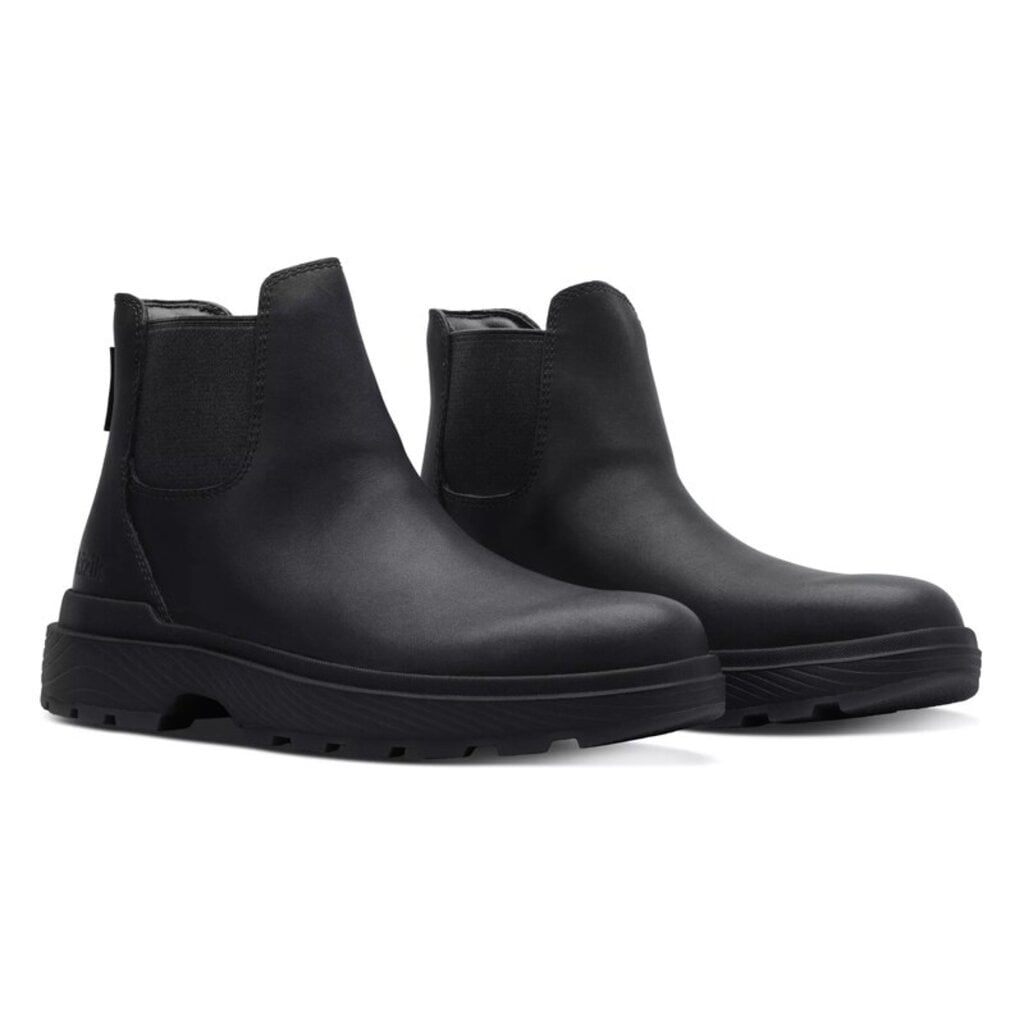 Black Chelsea boots side-by-side showing elastic gore and rugged tread sole