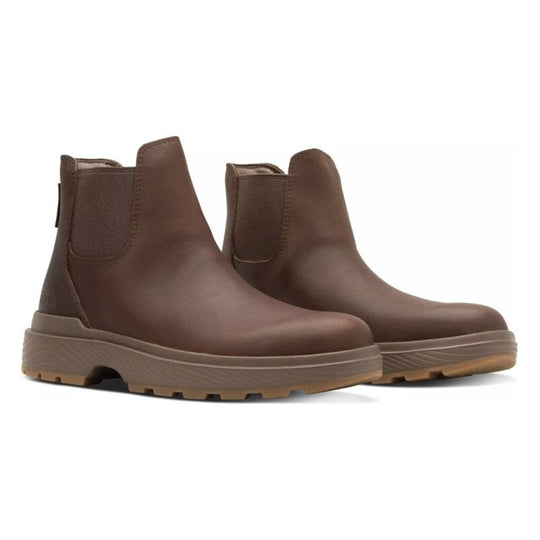 Two dark brown Kizik Sierra Chelsea boots, side-by-side, elastic gore and tread outsole.