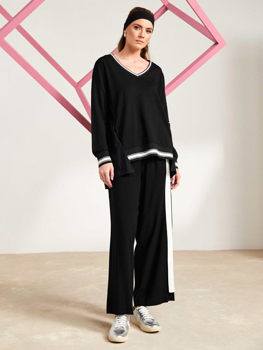 Naya top with Athleisure trim and Zip Sleeve Detail in Black