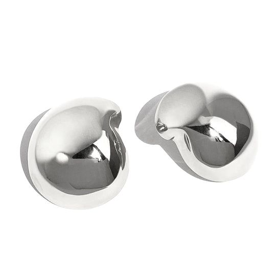 Pair of chunky twisted metal stud earrings with sculptural knot design on white background