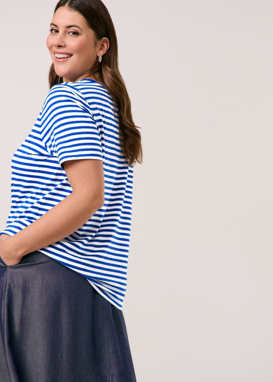 side view on model of Samoon plus size cotton blend Striped Short Sleeve Tee with Print Front in Skydiver Blue Stripe