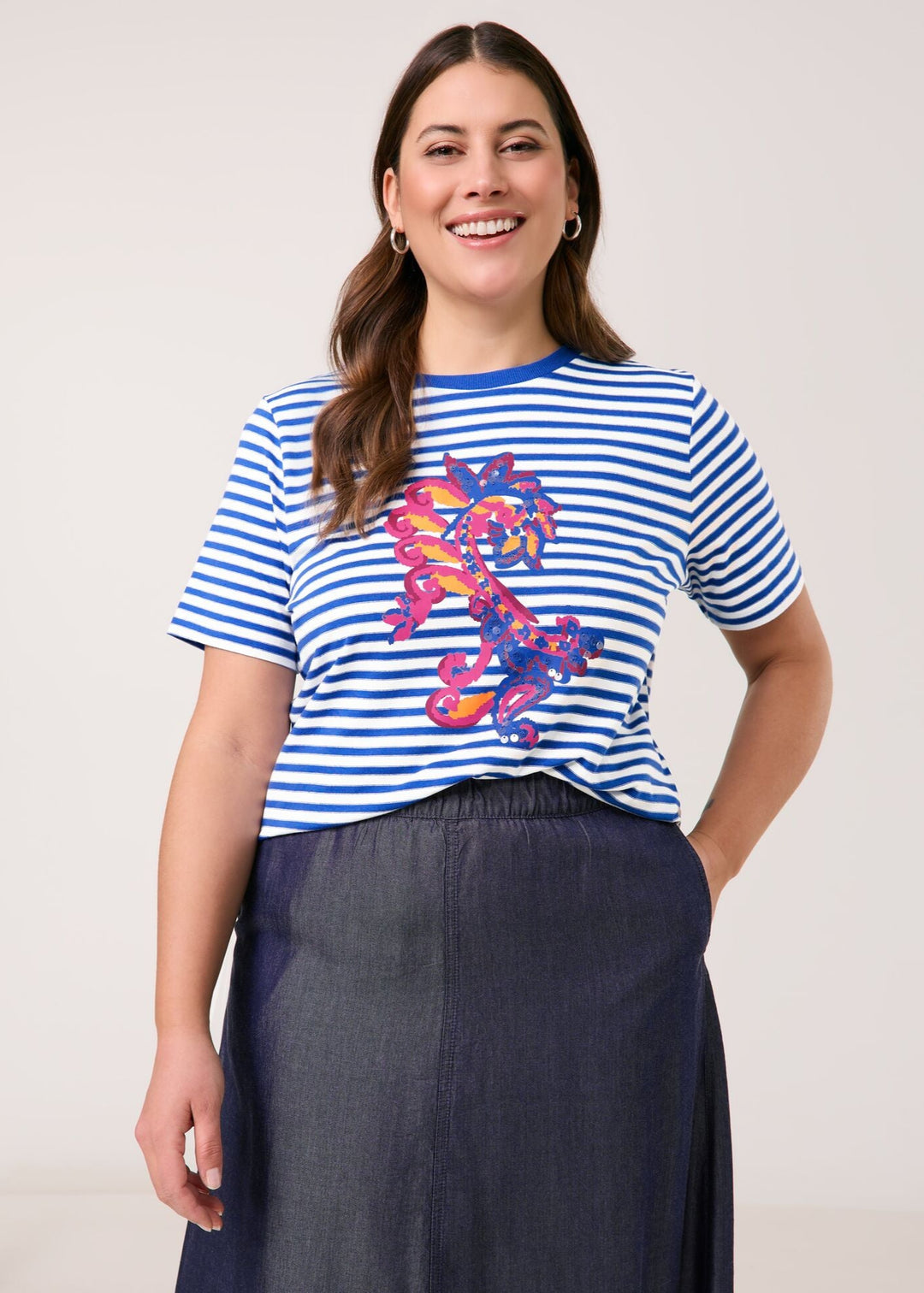 front view on model of Samoon plus size cotton blend Striped Short Sleeve Tee with Print Front in Skydiver Blue Stripe
