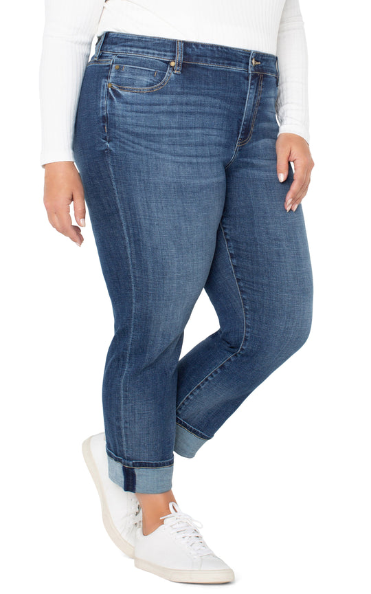 Women's blue denim girlfriend jeans with five-pocket design and cuffed ankle hem