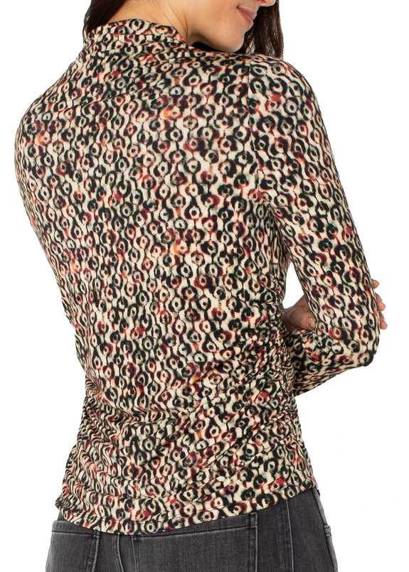back view of plus size Liverpool Long Sleeve Pleated Mock Neck Knit Top in Multi Geo Ikat