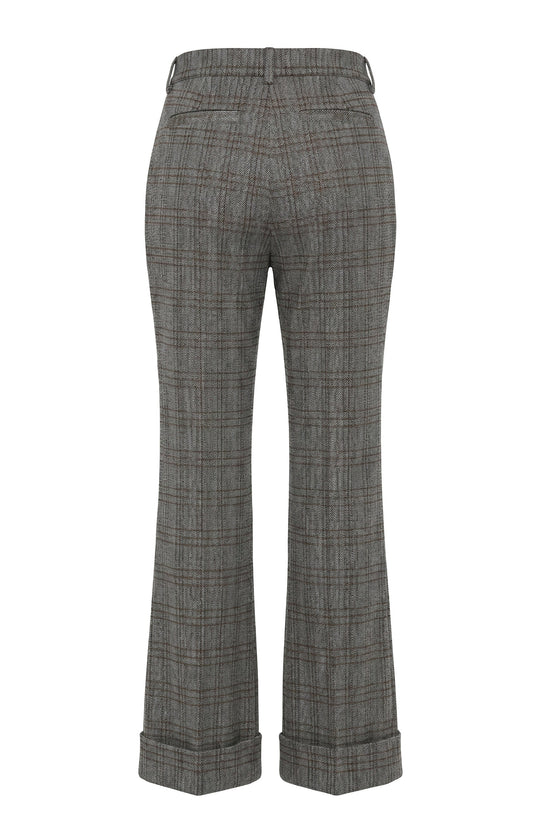 High-rise flare trousers in dark gray herringbone weave, back view, flared hems
