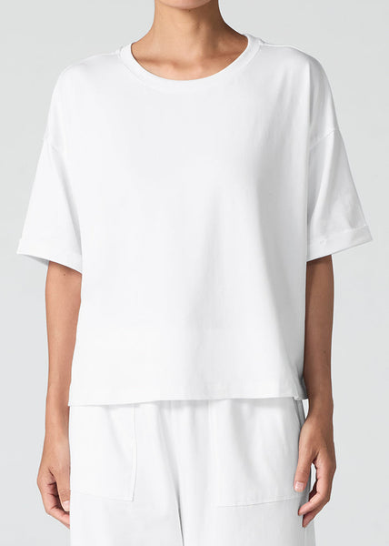 front view of Eileen Fisher plus size organic cotton stretch jersey boxy tee with cuffed Sleeve in colour white