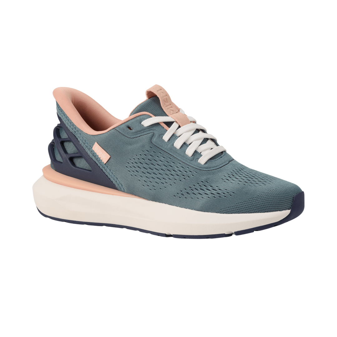 Kizik Athens 2 sneakers in stormy teal with white laces, rose accents, and sculpted sole