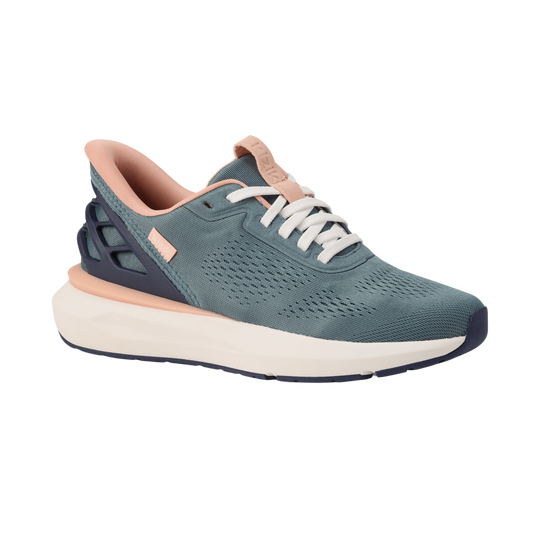 Kizik Athens 2 sneakers in stormy teal with white laces, rose accents, and sculpted sole