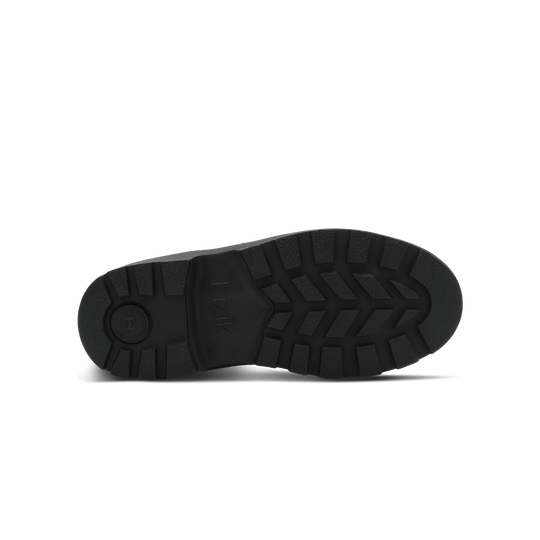 Black rubber outsole with molded tread pattern for traction