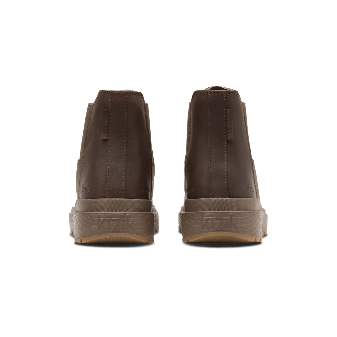 Back view of dark brown Kizik Sierra Chelsea boots with cushioned heel and branding tab.