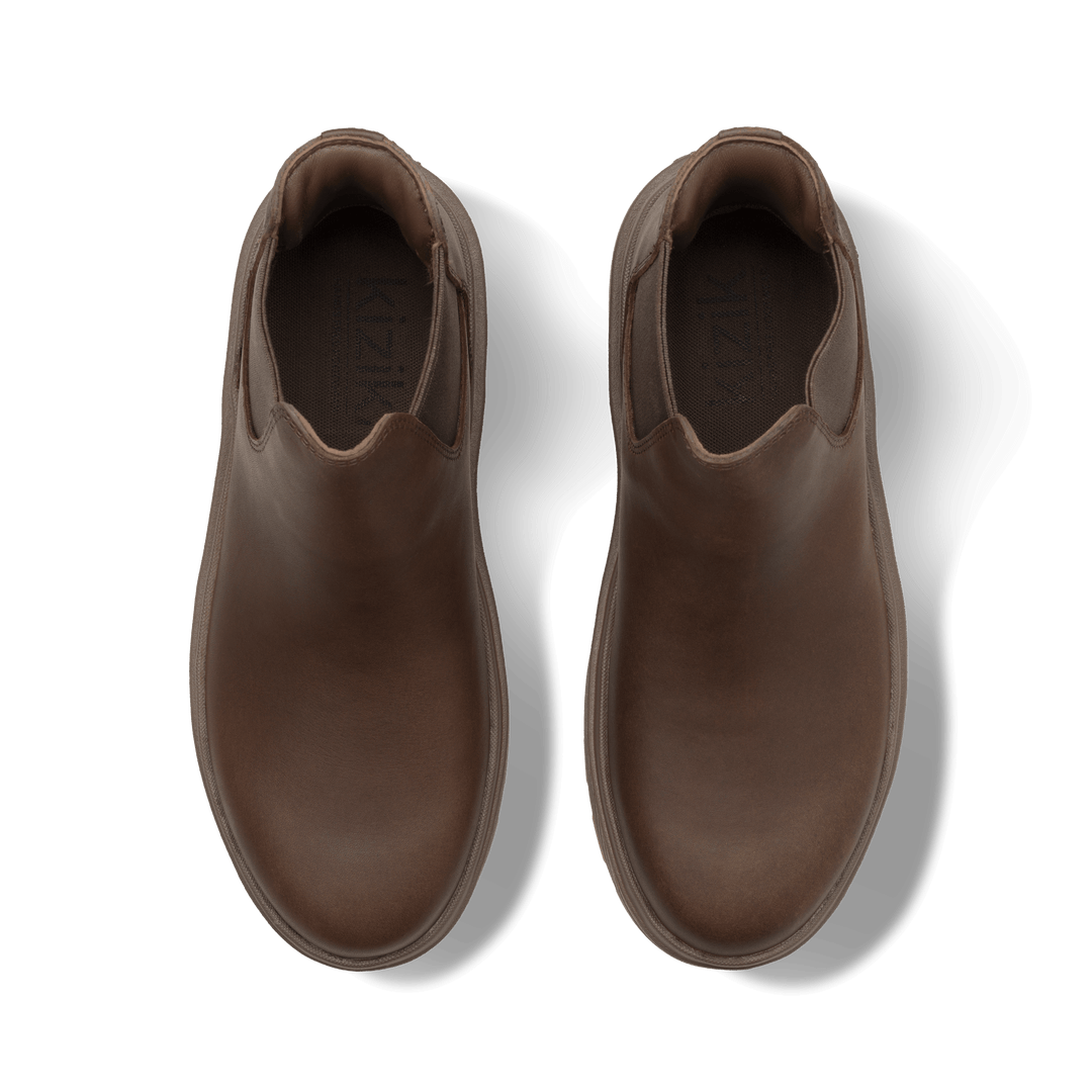 Kizik Sierra Chelsea boots, dark brown interior opening with stitched collar and pull-on design.