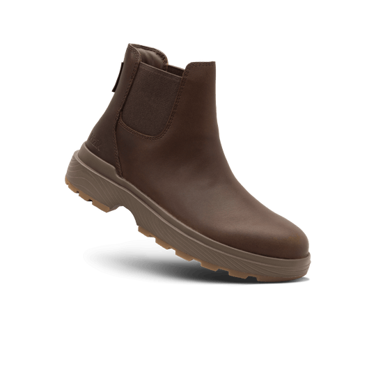 Dark brown Kizik Sierra Chelsea boot, angled view with elastic side panels and tread sole.