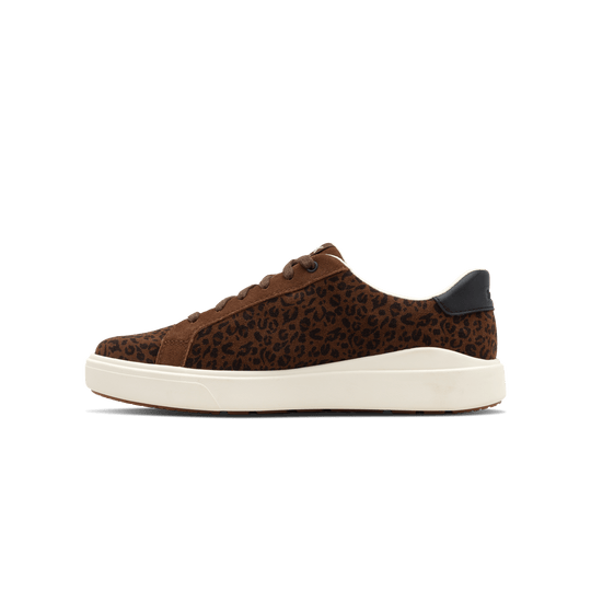 Brown leopard print Kizik sneakers with lace-up closure and white outsole midsole