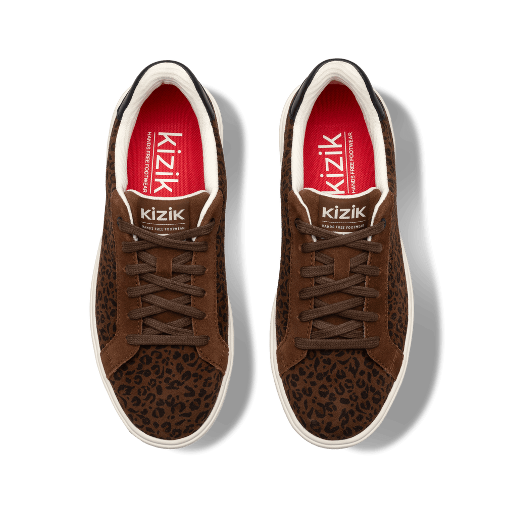Kizik W Vegas 2 sneakers in brown leopard print with lace-up front and white sole
