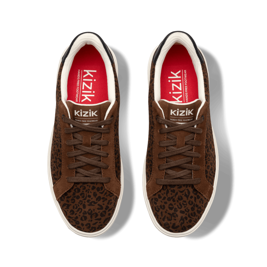 Kizik W Vegas 2 sneakers in brown leopard print with lace-up front and white sole
