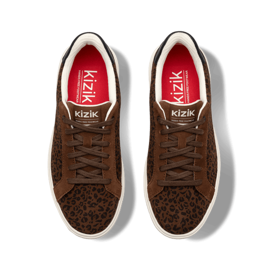 Kizik W Vegas 2 sneakers in brown leopard print with lace-up front and white sole
