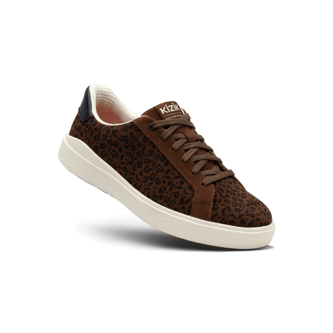 Leopard print lace-up Kizik sneakers with white rubber sole and padded collar