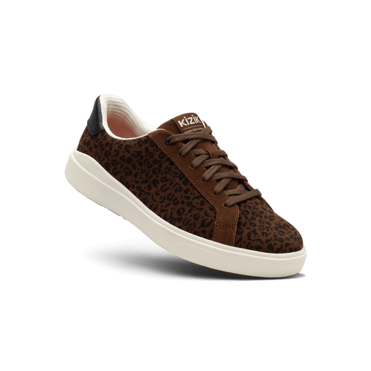 Leopard print lace-up Kizik sneakers with white rubber sole and padded collar