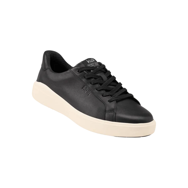 Black low-top sneaker side profile with lace-up design and off-white midsole